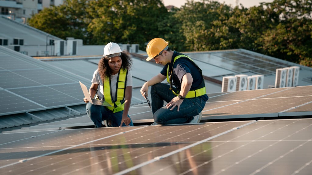 service-engineer-checking-solar-cell-on-the-roof-f-2025-03-17-22-45-26-utc » GAMZs Ground Lease Buyout Service engineer inspecting a solar panel on a roof, highlighting considerations during a solar lease buyout to ensure maximum value and performance.