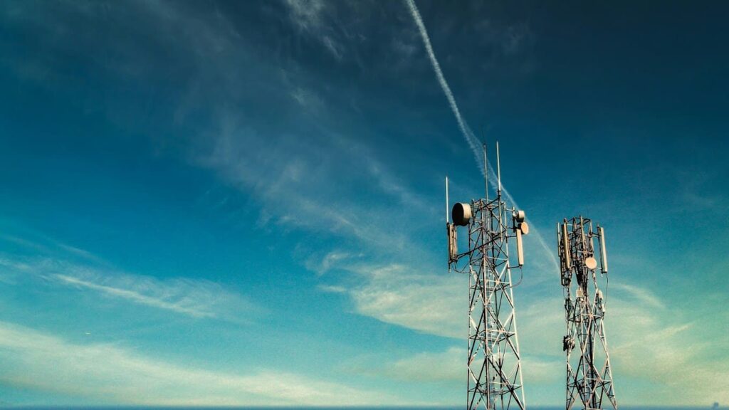 Cell tower infrastructure used in telecommunications, illustrating scenarios where businesses may choose to Assume the lease for long-term operational continuity.