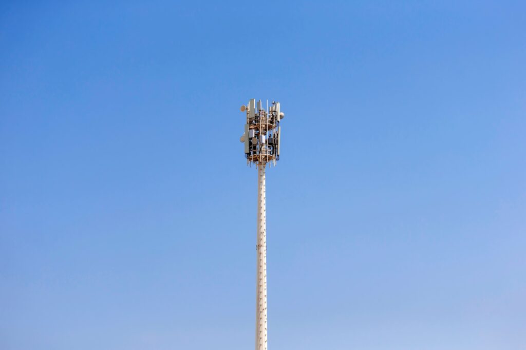 Cell tower on rural land representing infrastructure assets involved in a cell tower lease buyout negotiation and long-term property agreement decisions.