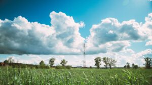 telecommunications-cell-phone-tower-with-antenna-a-2025-02-24-16-57-20-utc » GAMZs Ground Lease Buyout Cell tower in a vast open field symbolizing a landowner’s decision to have someone Take over my lease or sell it outright.
