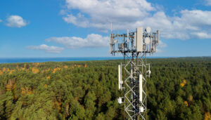 Telecommunication cell tower on a property, illustrating a Cell Tower Lease generating long-term income for property owners.