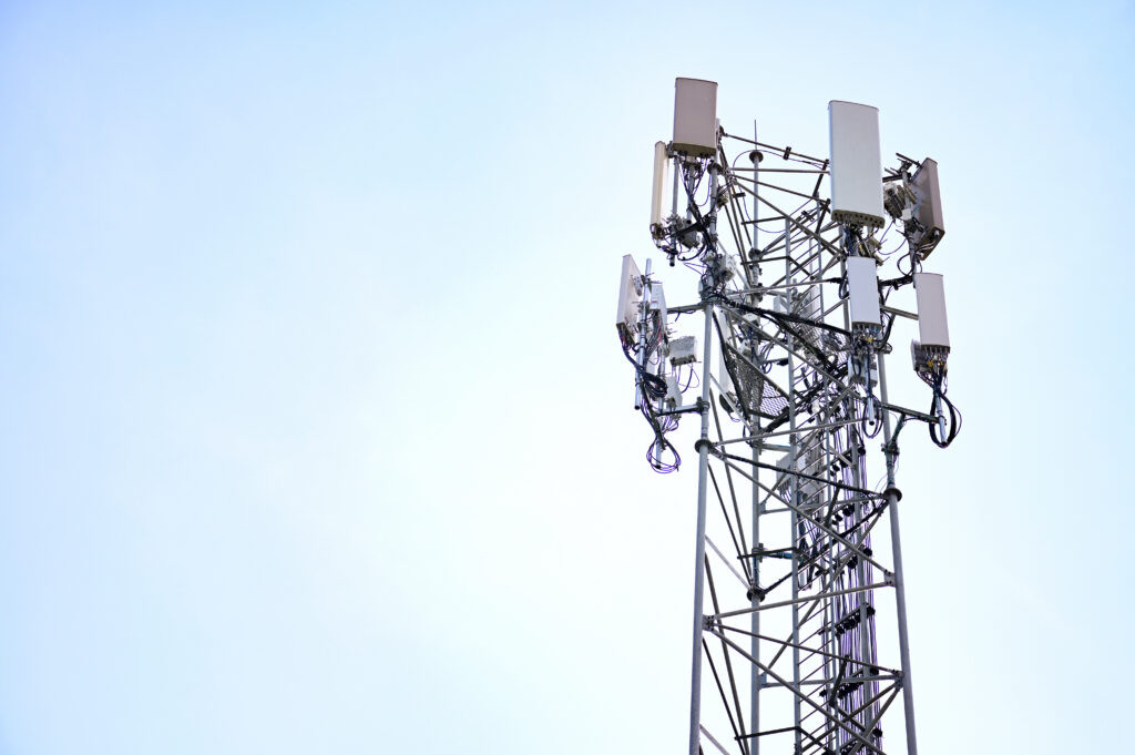 5G tower representing Digital Infrastructure, highlighting investment opportunities and revenue potential from network leases.
